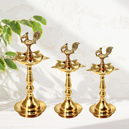 Handmade Brass Oil Lamp for Pooja
South Indian Style Brass Diya
Pure Brass Diya Stand for Temple
Peacock Brass Diya for Home Decor