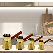 Traditional hotelware coffee warmer
Luxury brass coffee maker UAE
Coffee serving pot with stone texture
Decorative Turkish coffee pot
Brass hotelware pot for serving coffee
Traditional coffee warmer with handle
Gold-finish coffee pot with rocks
Durable hotelware brass coffee pot
UAE-style Turkish coffee server