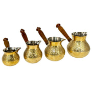 Small brass pot for rich coffee
Gold-finish Turkish brewing pot
Durable handcrafted cezve
Brass pot for serving coffee
Elegant Turkish coffee tool
Hand-engraved Arabic cezve
Cezve for home or hotel use
Decorative brass coffee pot