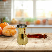 Brass Turkish coffee pots
Handmade brass coffee warmers
Brass pots with wooden handles
Arabic coffee warmer set