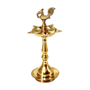 Brass Kerala Diya Stand with Peacock
Traditional Kerala Brass Diya UAE
Pure Brass Diya Stand for Temple
Peacock Brass Diya for Home Decor