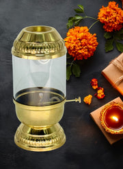 Brass Akhand Jyot with cover
Indian artisan-made brass diya
Brass diya for Diwali decor
Gold polish temple diya lamp