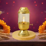 Decorative brass diya for home
Brass Akhand Jyot with cover
Religious brass lamp for prayer
Indian artisan-made brass diya
Brass diya for Diwali decor
Gold polish temple diya lamp
Brass diya with adjustable lever