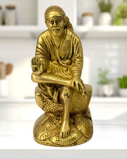 Brass Saibaba Idol for Gifting UAE
Made by Hand Brass Statue
Hand Engraved Brass Idol
Solid Brass Saibaba Sculpture
Made in India Religious Idol
Gold Antique Finish Brass Statue