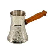 Brass coffee pot with engraved rock pattern
Arabic coffee maker with long handle
Vintage-style Turkish coffee pot
Rock design coffee cezve UAE
Handmade Turkish coffee pot with details
Decorative brass pot for coffee brewing
Silver finish coffee pot for Arabic tea
Brass Arabic coffee warmer pot UAE