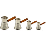 Brass coffee pot with engraved rock pattern
Arabic coffee maker with long handle
Vintage-style Turkish coffee pot
Rock design coffee cezve UAE
Shiny silver-plated brass coffee pot
Handmade Turkish coffee pot with details
Decorative brass pot for coffee brewing
Silver finish coffee pot for Arabic tea
Brass Arabic coffee warmer pot UAE