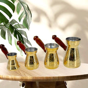 Brass Turkish coffee pots
Handmade brass coffee warmers
Brass pots with wooden handles
Arabic coffee warmer set
Engraved brass coffee makers
Luxury Turkish coffee pots
Gold brass Turkish coffee set
Middle Eastern coffee pots UAE
Traditional coffee brewing pot
Luxury kitchenware UAE
Brass tea maker pots set
Antique brass coffee warmer
Turkish coffee pot with wood handle
Decorative brass coffee kettle