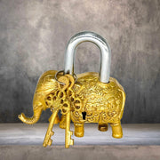 Gold brass elephant padlock
Antique green patina lock
Vintage elephant shape lock
Handcrafted elephant padlock
Rustic brass trunk lock
Decorative brass door lock
Brass lock for cabinets
Artistic elephant lock design
Unique Indian motif padlock