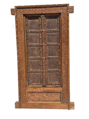 Antique wood frame
Indian carved panel
Wood and iron window