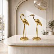metal bird statues, cast brass crane pair, engraved brass bird figurines, hand-carved brass birds, intricate feather carving sculptures, embossed brass bird statues, detailed brass craftsmanship, 