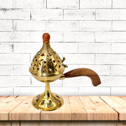 Brass Charcoal Burner with Cut Pattern
Classic Brass Mabkhara with Wooden Grip
Charcoal Burner Holder