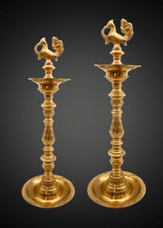 Gold Finish Brass Diya
South Indian Traditional Brass Lamp
Hand Engraved Brass Pooja Lamp
Made In India Brass Product
Solid Brass Oil Lamp
Indian Brass Diya For Ceremony
Brass Temple Diya 60 Inches