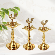 Handmade Brass Oil Lamp for Pooja
South Indian Style Brass Diya
Pure Brass Diya Stand for Temple
Peacock Brass Diya for Home Decor