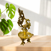 Brass Peacock Diya Oil Lamp
Handcrafted Peacock Diya UAE
Brass Deepam for Home Temple
Gold Antique Finish Diya