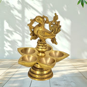 Brass Kerala Oil Lamp
Handcrafted Peacock Diya UAE
Brass Deepam for Home Temple
Gold Antique Finish Diya
Brass Oil Lamp for Pooja
