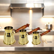 Handcrafted brass coffee warmer UAE
Arabic style coffee pot gold finish
Jali carved handle brass cezve
Traditional Turkish coffee pot Dubai
Luxury coffee warmer with jali grip
Brass coffee maker with wood handle
UAE handcrafted Arabic coffee pot
Al Athar brass coffee pot with jali
Golden finish Turkish coffee kettle