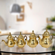 Embossed brass teapot with Taj design
Traditional brass kettle for serving tea
Gold-finish brass teapot with intricate patterns
Handcrafted brass tea kettle with handle
Luxury brass serving pot for tea
Ornamental gold-finish tea kettle
Brass teapot with rich embossed details
Traditional Indian brass tea serving pot
Gold-finish handicraft brass teapot
