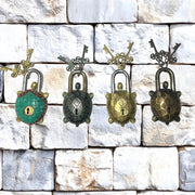Brass tortoise lock UAE
Antique padlock with keys Dubai
Decorative brass lock with stone inlay
Handcrafted brass locks UAE
Vintage tortoise padlock
Spiritual brass lock Sharjah