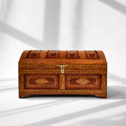 Inlaid dome chest with brass handle
Decorative wooden chest Abu Dhabi
Wooden chest for collectables
