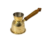 Traditional Arabic coffee maker in gold
Luxury brass coffee pot with gold accents
Gold-plated Turkish pot for serving coffee
Ornate gold Turkish coffee maker
Middle Eastern coffee pot with rich design
Gold-finished traditional coffee server
Brass coffee maker with intricate patterns
Gold-lined Arabic coffee pot
Stylish Turkish coffee pot in gold