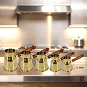 Brass Turkish cezve with jali handle
Gold finish Arabic coffee pot UAE
Traditional coffee warmer pot Dubai
Handmade brass pot for Turkish tea
Emirati coffee pot with carved handle
Vintage brass coffee pot with grip
Ornate jali handle brass cezve
Decorative Turkish coffee kettle
Dubai-style Arabic brass coffee pot
Elegant hand-engraved Turkish coffee pot
Brass Turkish coffee pot with wooden jali handle
Handcrafted brass coffee warmer UAE
Arabic style coffee pot gold finish