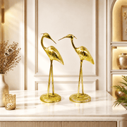 brass crane birds, golden crane pair, decorative crane statues, brass crane couple, long-legged bird sculptures, brass heron birds, golden heron pair, decorative heron statues, brass egret pair, 