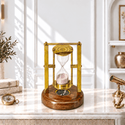 Nautical Brass Sand Timer UAE, Brass Hourglass with Compass, Two Minute Brass Sand Timer, Brass Sand Timer with Wooden Base, Gold Finish Nautical Timer, Antique Brass Hourglass with Compass, Brass Sand Timer for Desk Decor.