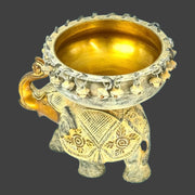 Brass Urli Bowl for Temple Decor
Antique Finish Brass Pooja Stand
Handmade Brass Pooja Urli
Brass Elephant urli with rustic finish