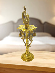 Brass Peacock Diya
Handcrafted Oil Lamp
Brass Pooja Diya
Traditional Indian Diya
Peacock Brass Lamp