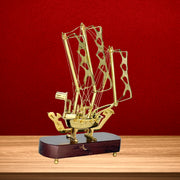 Handmade brass ship model
Wooden base brass décor
Antique gold brass ship
Handcrafted brass art piece
Vintage nautical brass décor