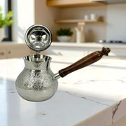 Turkish coffee cezve wholesale Dubai
Middle Eastern coffee pot Sharjah
Turkish coffee serving pot UAE
Antique brass coffee pot with lid Dubai
Silver finish Turkish coffee cezve UAE