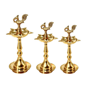 Brass Kerala Diya Stand with Peacock
Traditional Kerala Brass Diya UAE
Peacock Design Brass Diya Stand
Handmade Brass Oil Lamp for Pooja