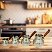 Silver-plated Turkish coffee pot
Traditional turkish cezve
Coffee maker with silver finish
Lid-free turkish coffee pot
Middle Eastern coffee serving pot
Durable metal coffee maker
Hotelware turkish pot
Arabic-style coffee cezve
Short handle silver coffee pot
Classic turkish serving pot