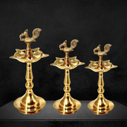 Brass Kerala Diya Stand with Peacock
Traditional Kerala Brass Diya UAE
Peacock Design Brass Diya Stand
Peacock Brass Diya for Home Decor