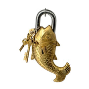 Fish-shaped padlock with cultural and spiritual symbolism
Ornate brass lock with turquoise inlay for doors and chests
Unique Indian antique padlock in fish design
Lock with antique finish and fish motif for home decoration
Handcrafted brass padlock perfect for rustic interiors