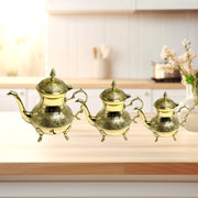 Gold-finish Peacock motif serving pot
Traditional brass teapot with handle
Moroccan-style Peacock engraved teapot
Luxury brass serving teapot
Gold-plated Peacock design pot
Ornate brass teapot for home decor
Peacock-engraved brass tea server
