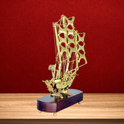 Handmade brass ship model
Wooden base brass décor
Antique gold brass ship
Handcrafted brass art piece
Vintage nautical brass décor
Indian brass handicraft ship