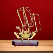 Handmade brass ship model
Antique gold brass ship
Handcrafted brass art piece
Vintage nautical brass décor
Indian brass handicraft ship