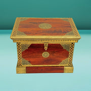 wooden storage box UAE
brass fitted storage chest
handcrafted wooden storage box
solid wood storage trunk
Rajasthani wooden storage chest
natural wood finish box